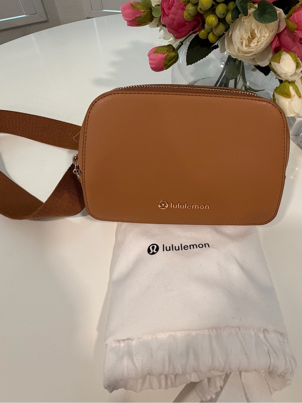 lululemon tan crossbody camera bag with adjustable strap